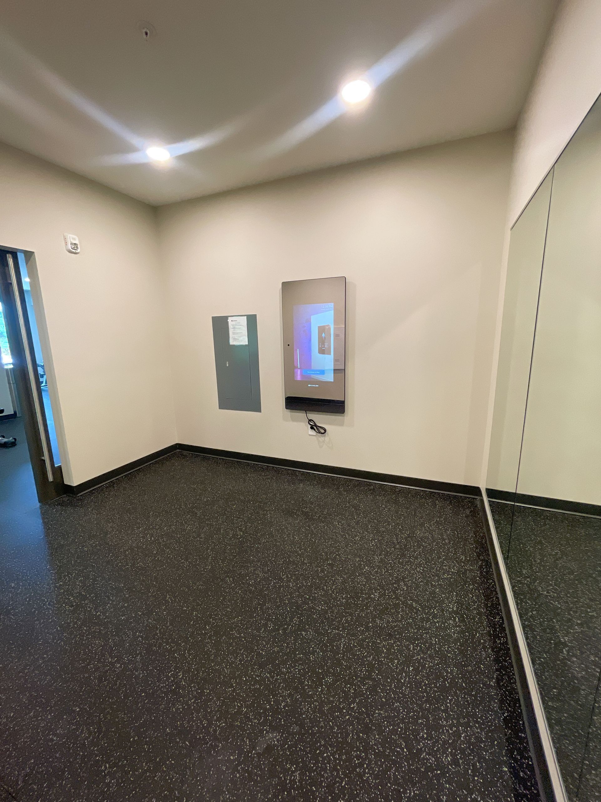 There is a large mirror in the middle of the room.