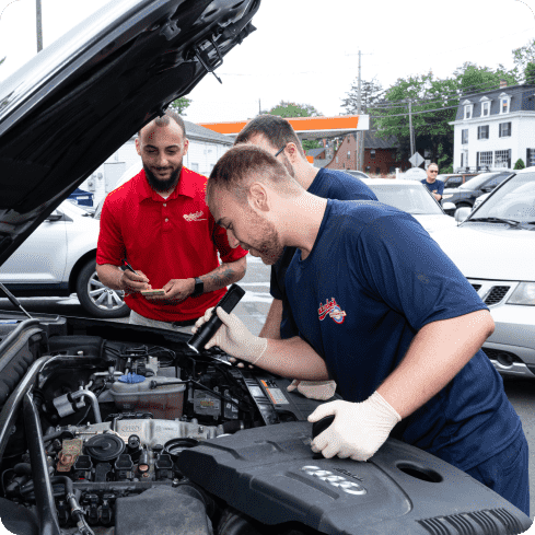 Staff Member Doing Maintenance | Palumbo's Automotive