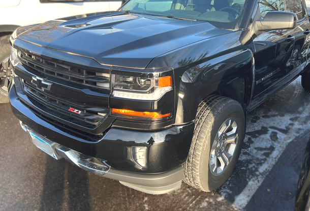 Vehicle with front end damage after repairs were performed by Modern Auto Body.