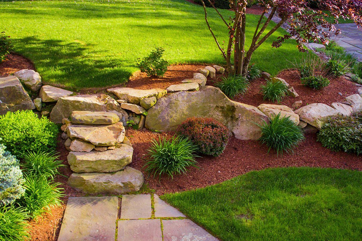 Landscaped Rock Stairs and Rock Wall — El Paso, TX — Daniel's Tree & Landscaping, Inc.