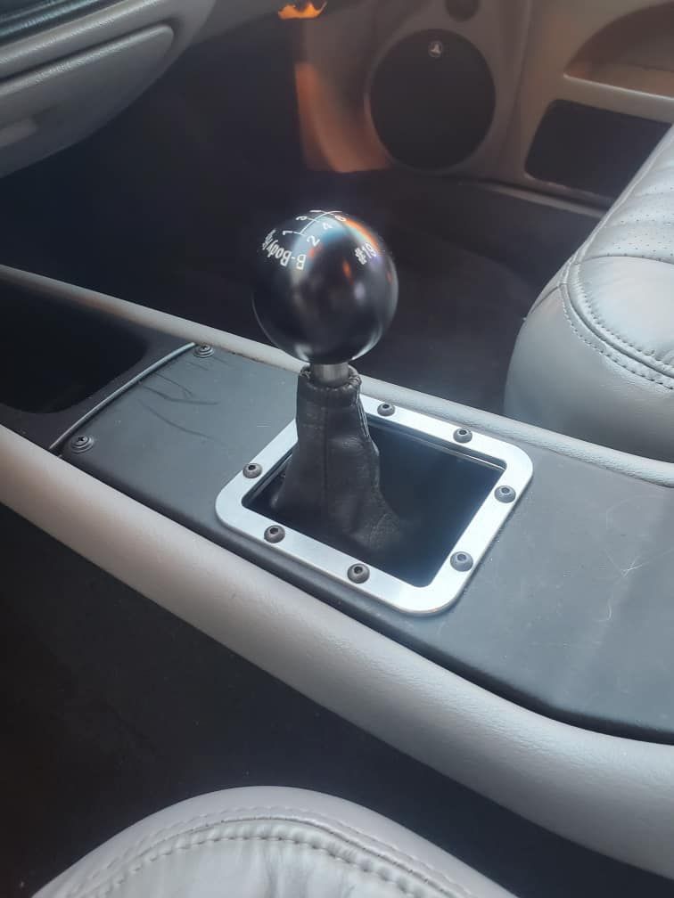 A close up of a shifter in a car