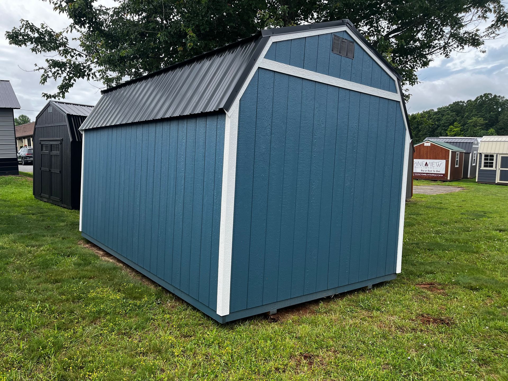 10 x 16 Lofted Barn Workbench and Shelves Plus Lofts