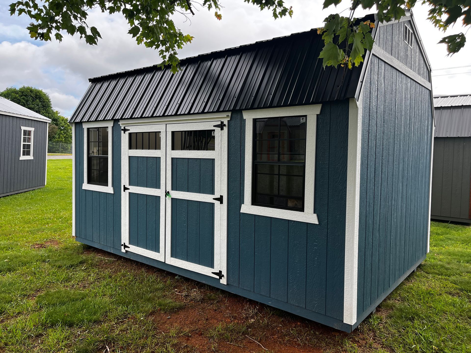 10 x 16 Lofted Barn Workbench and Shelves Plus Lofts