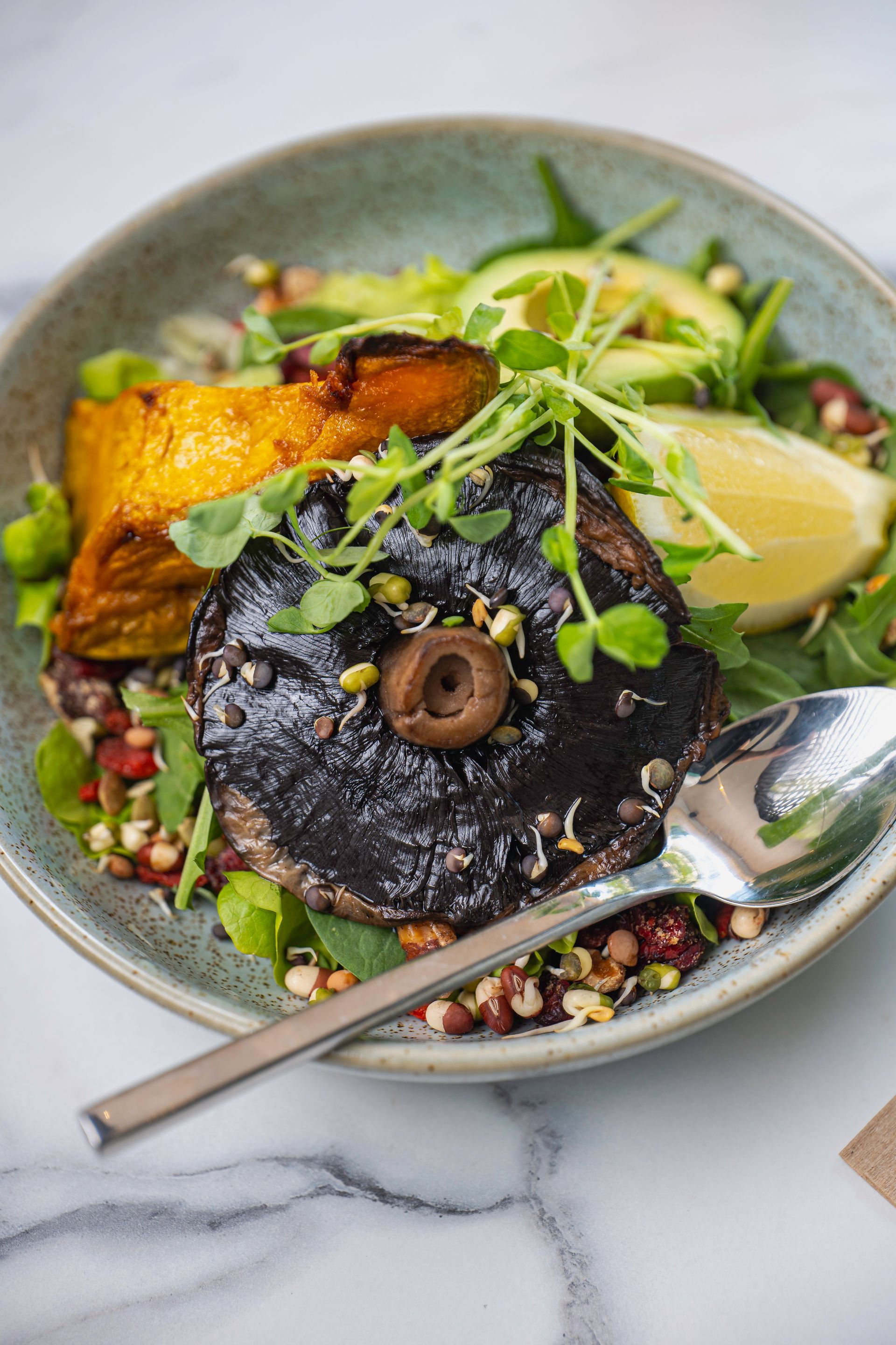 A Bowl of Food With a Spoon in It on a Table — The Pass Cafe In Byron Bay, NSW