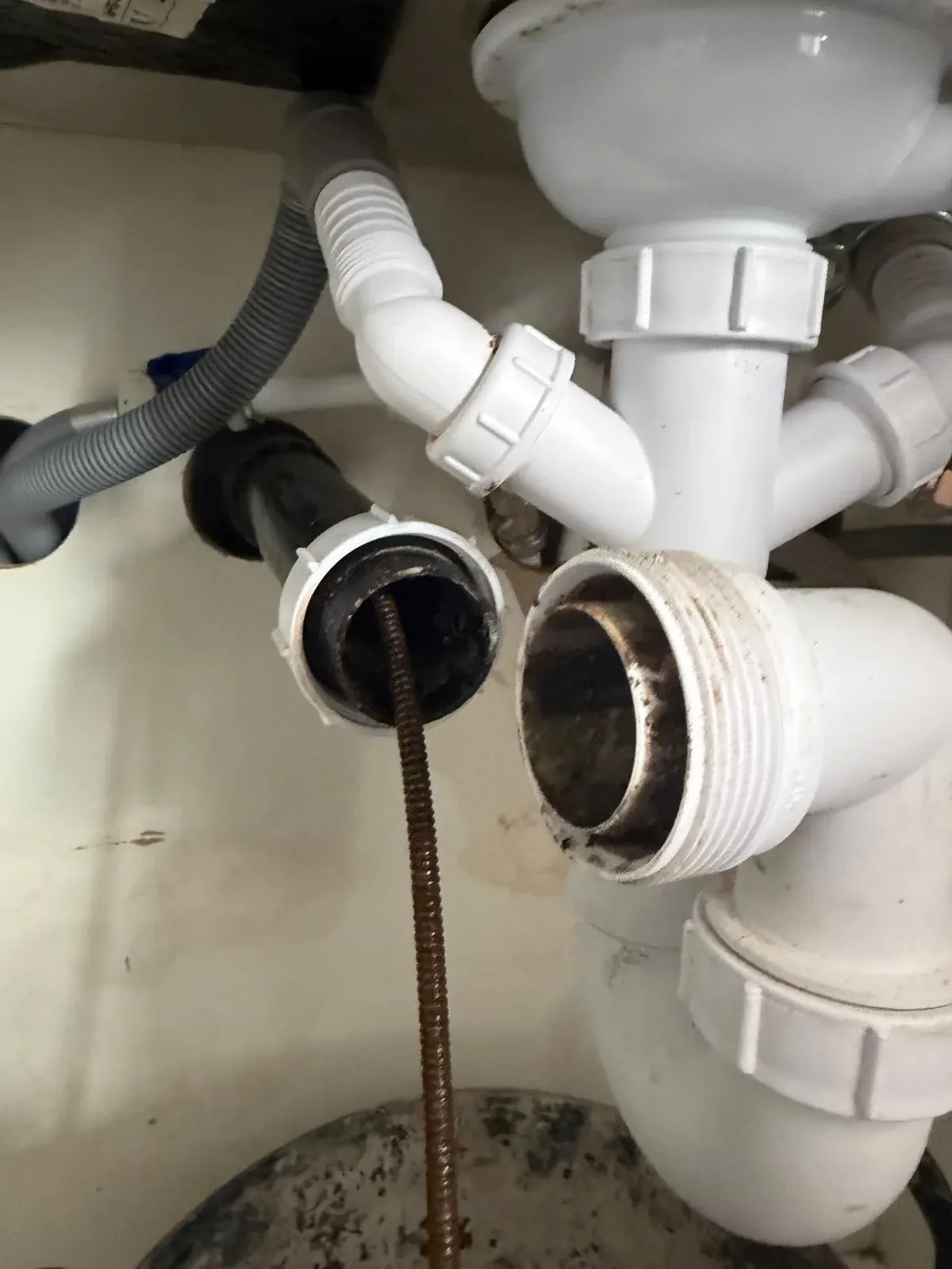 Blocked pipes under sink before