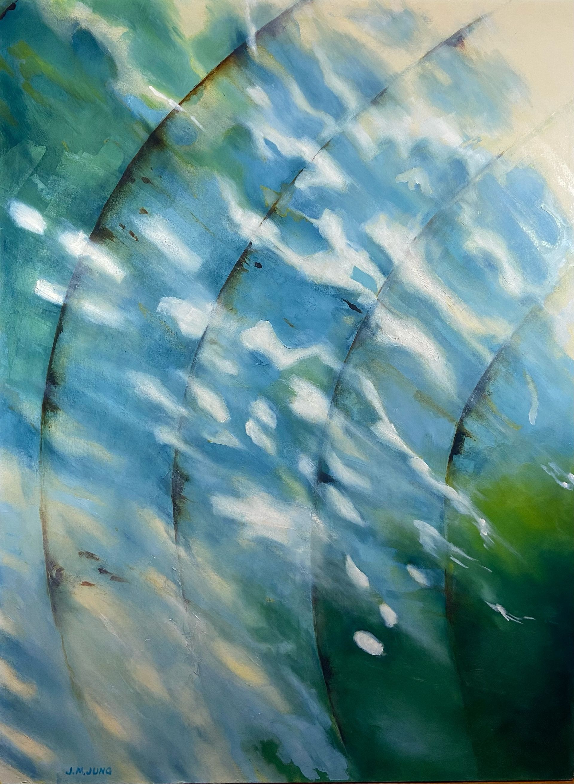 A close-up of a metal bridge, with the reflections of blue and green trees in April. There are white clouds reflected as well. 