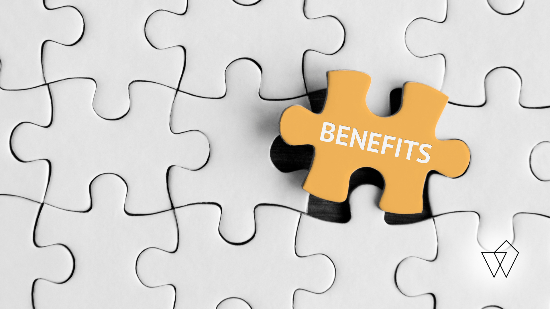 Orange puzzle piece labeled “BENEFITS” among white jigsaw pieces, with a small downward arrow at bottom right