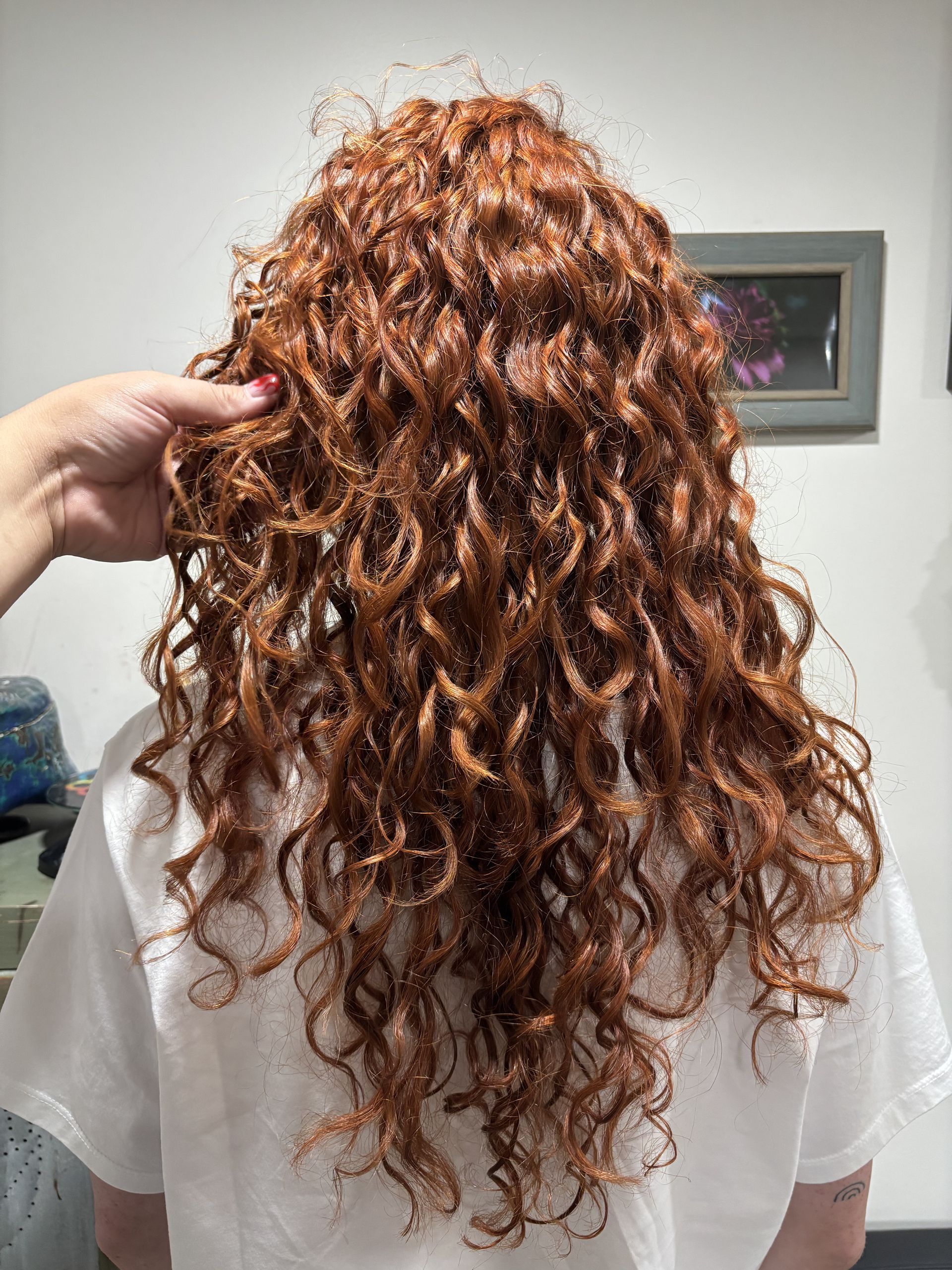 “Defined curly hairstyle finished with conditioning treatment in Sandy Utah”