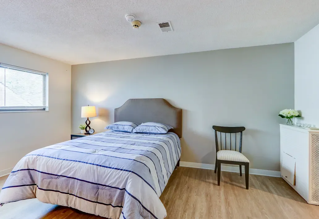 Interior of carpeted bedroom