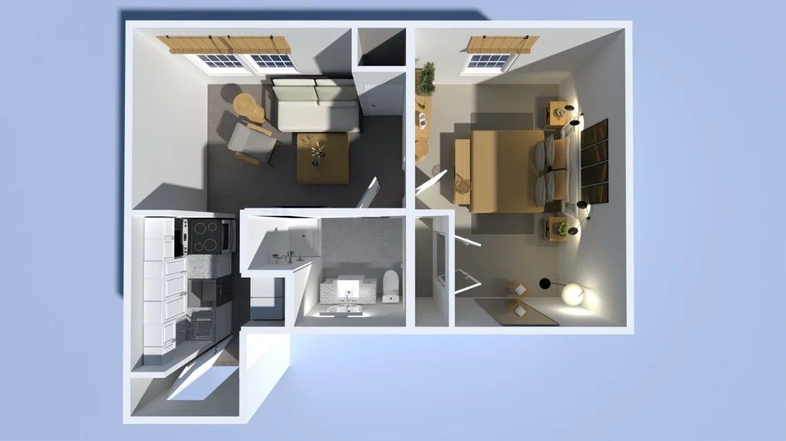 Top-down view of a small apartment layout. Contains a kitchen, living area, bedroom, and bathroom, all with furniture.