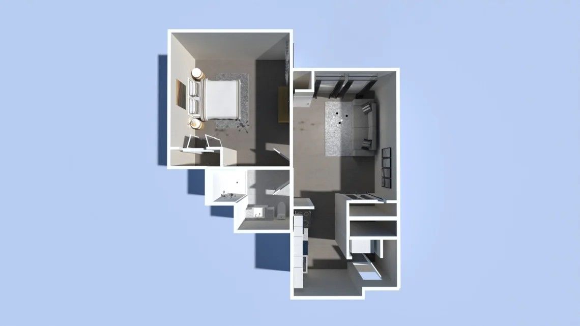 Top-down view of a small apartment floor plan with bedroom, living area, and kitchen in white and gray.