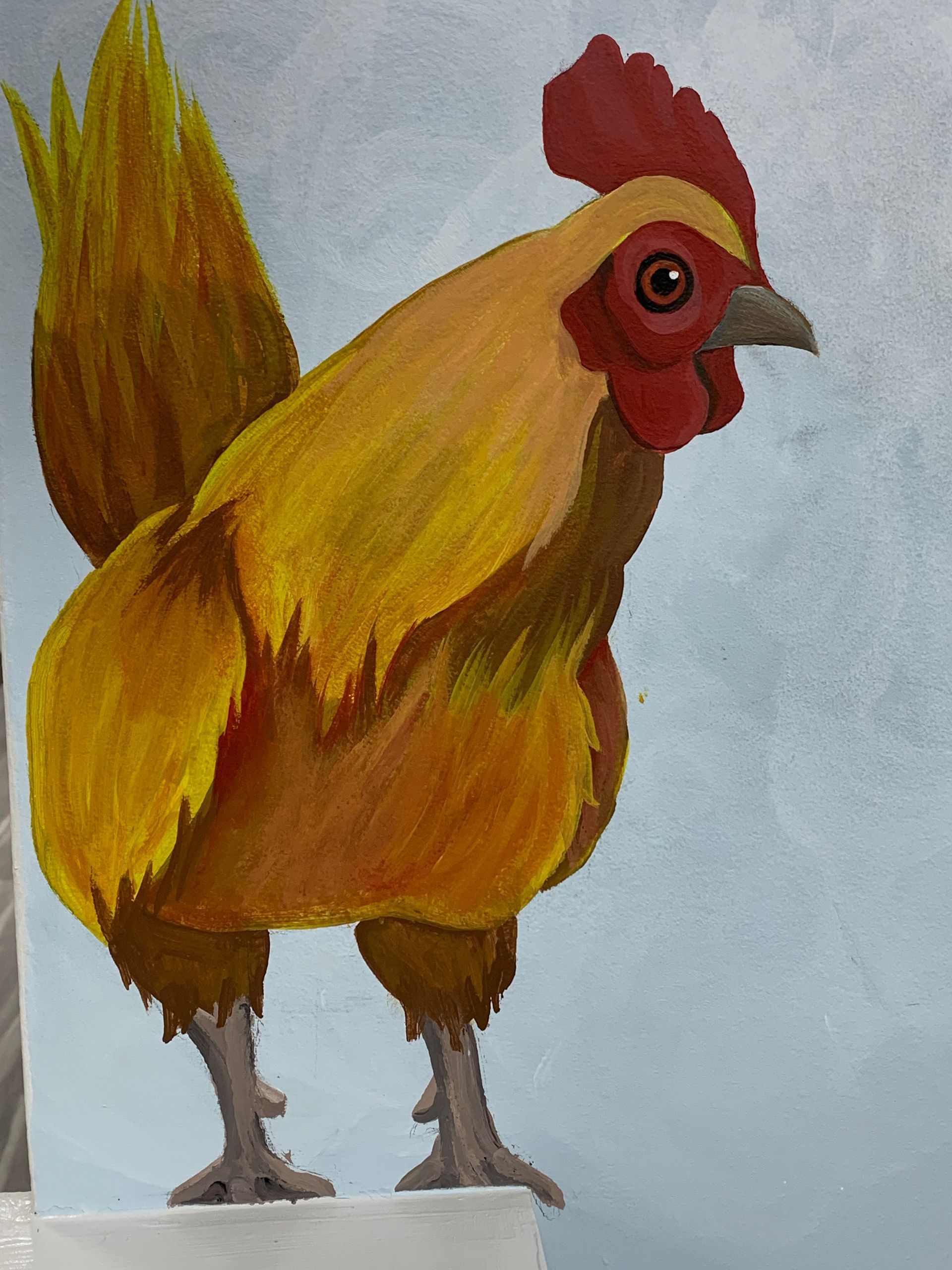 A painting of a rooster with a red crest at Advocare Fairmount Pediatrics