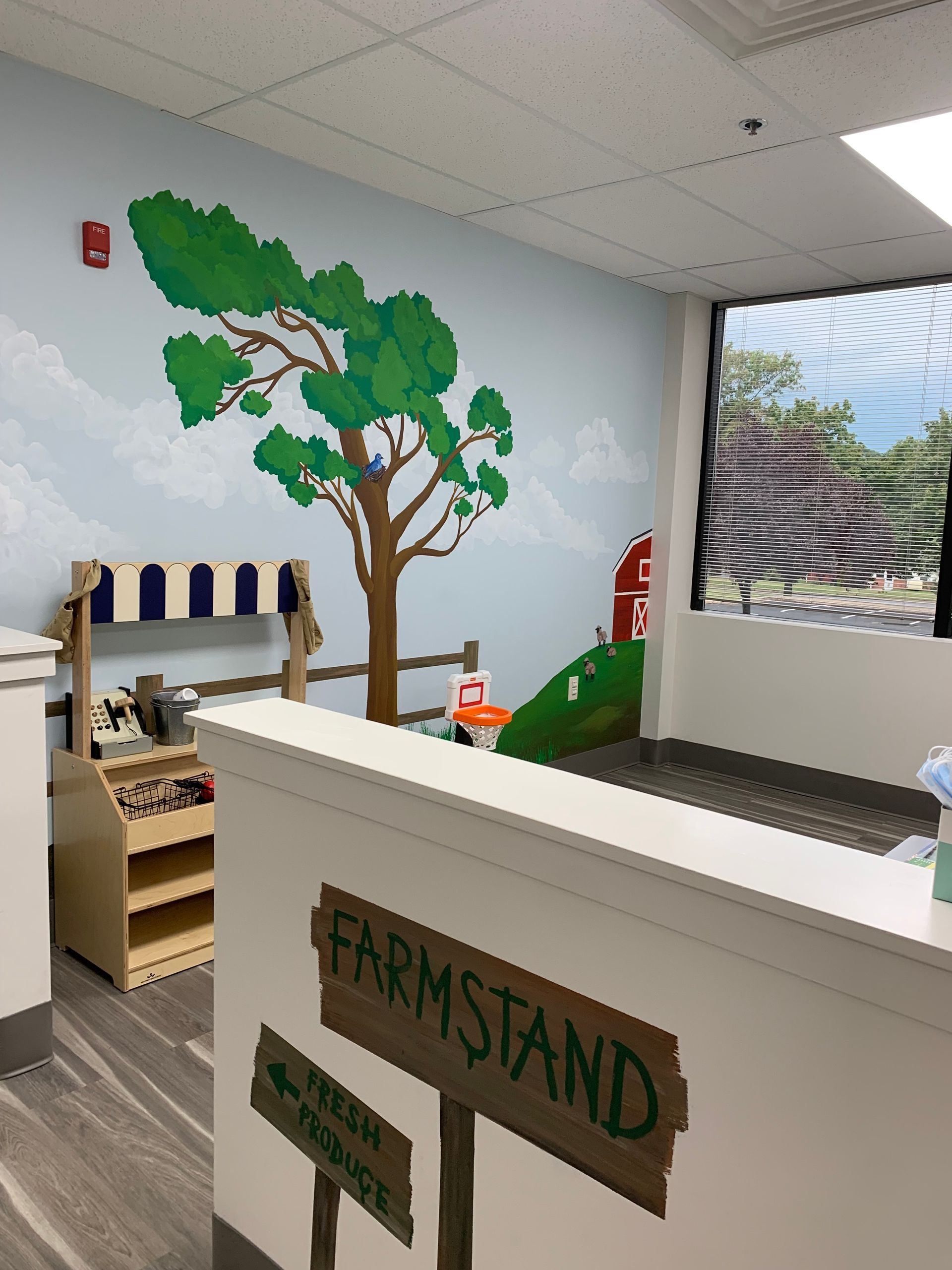 A room with a sign that says farmstand on it at Advocare Fairmount Pediatrics