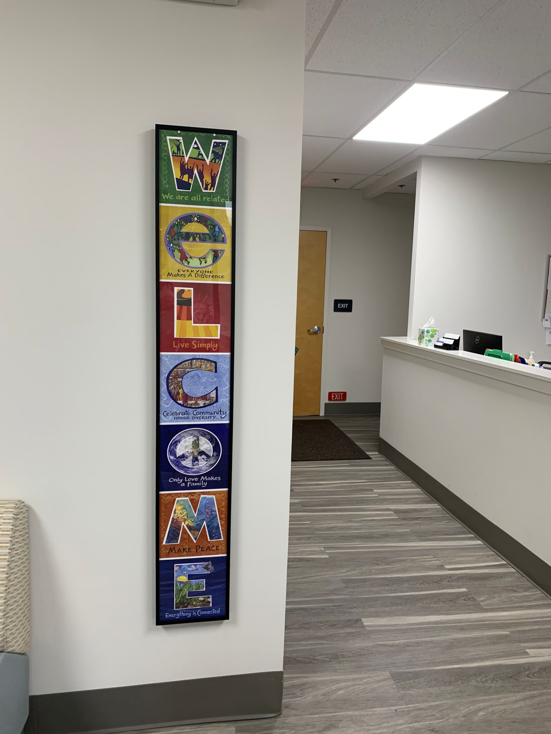 A sign on a wall that says welcome on it at at Advocare Fairmount Pediatrics