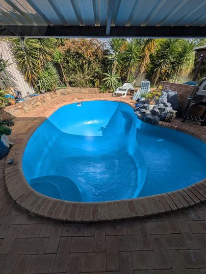 After image of a swimming pool which requires resurfacing.