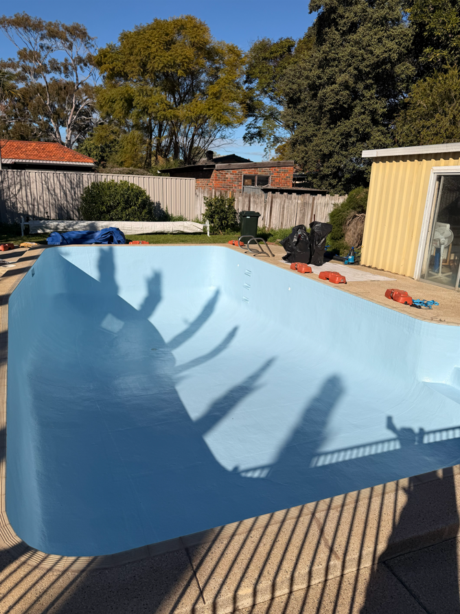 After image of a swimming pool which requires resurfacing.