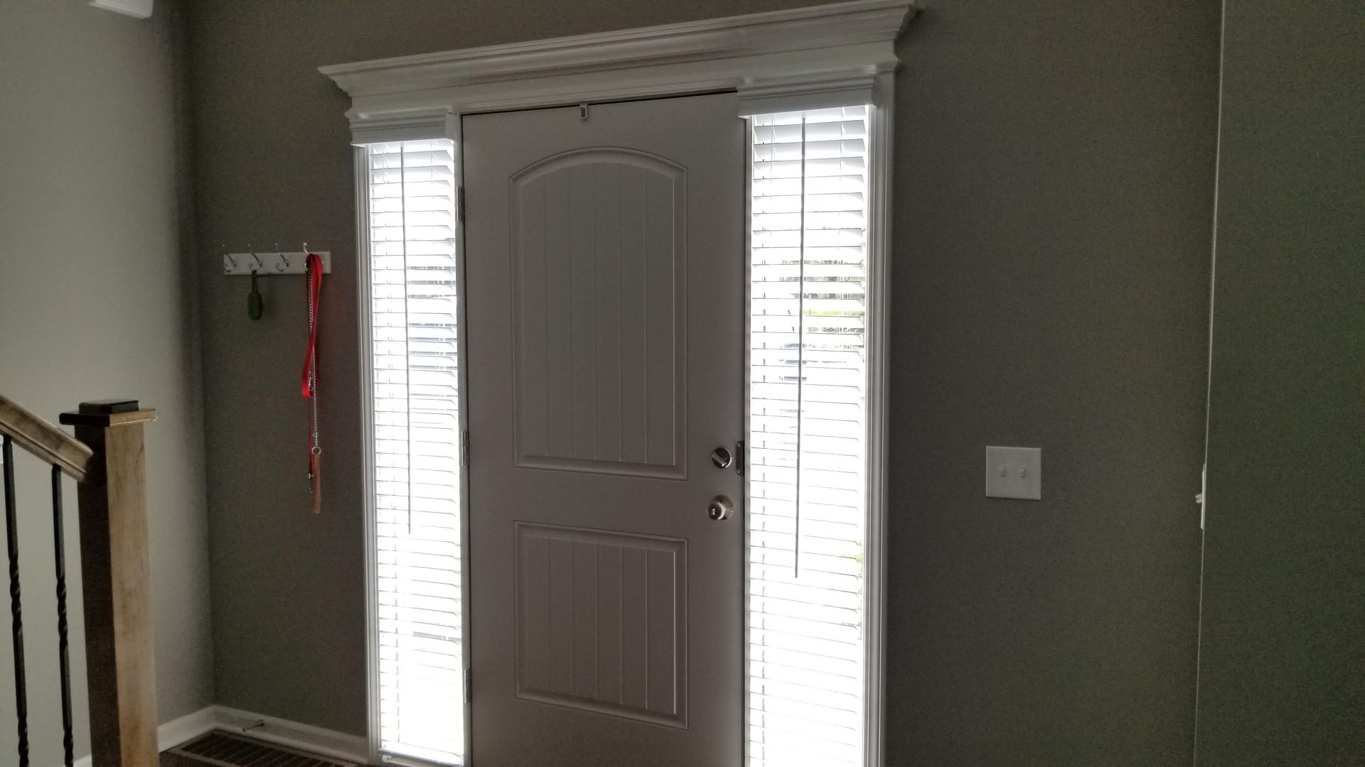 Solar Shield Roller Shade installed over a tall stairwell with hard to reach windows