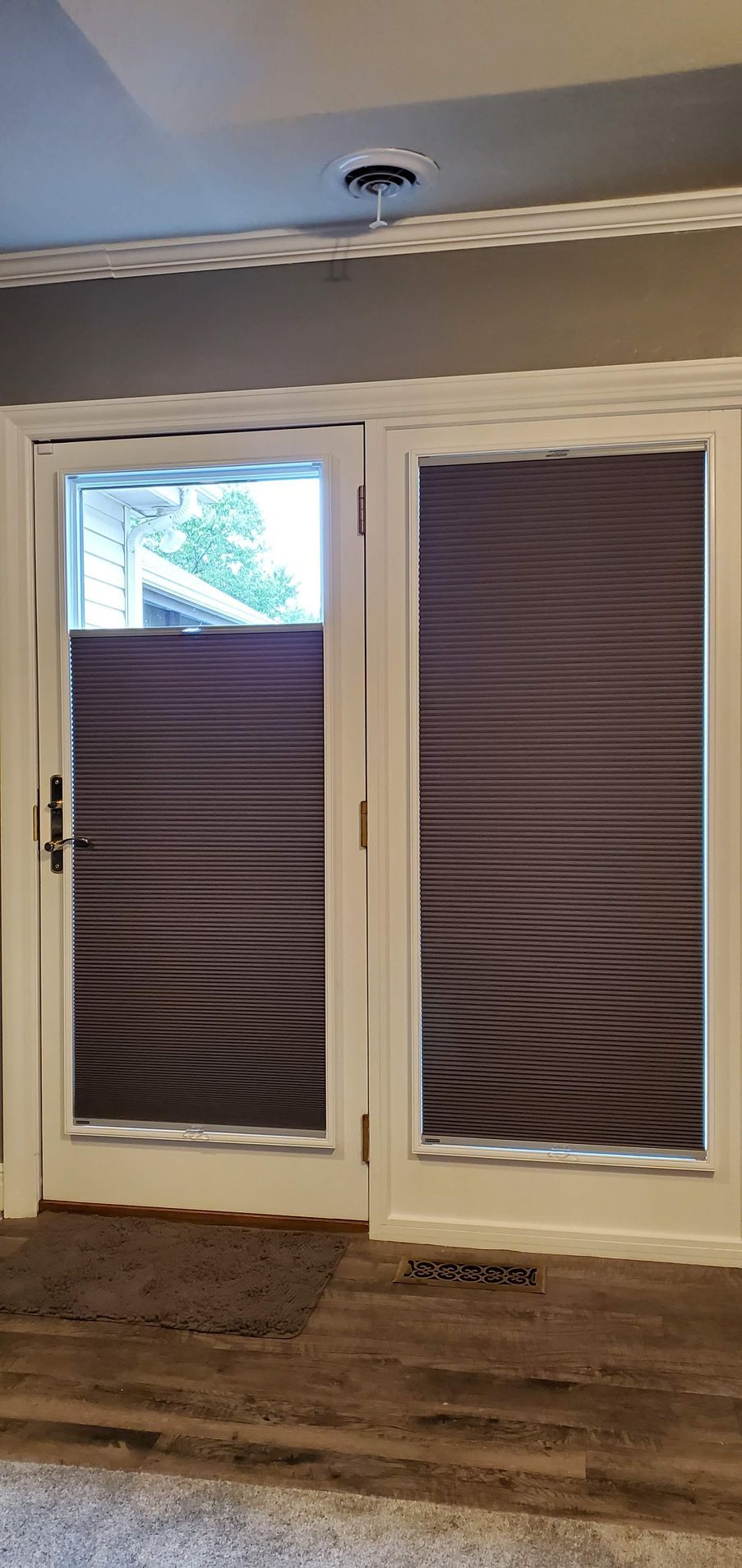 Solar Shield Roller Shade installed in windows looking over Lake Winnebago near Lee's Summit, MO 