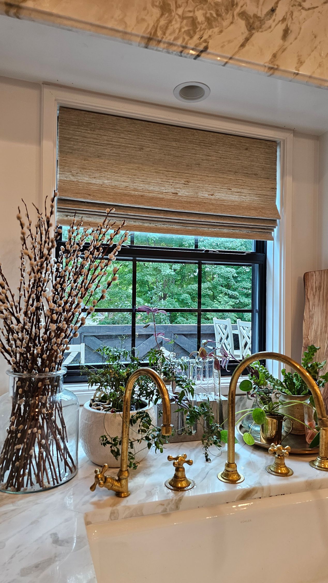 Natural Woven Shades by Solar Shield installed on kitchen sink window in Kansas City