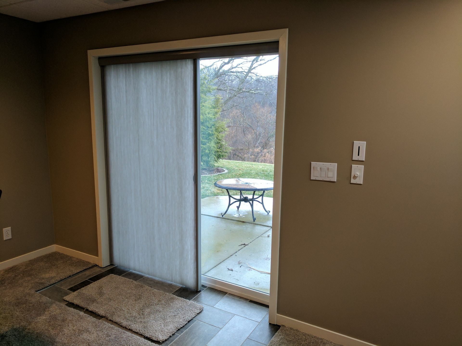 Solar Shield Honeycomb Shades installed on patio door