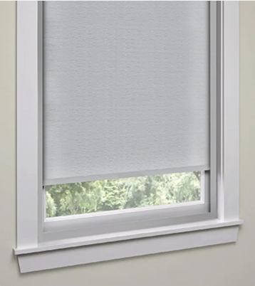 Solar Shield Roller Shade with privacy light blocks installed in window for better room darkening