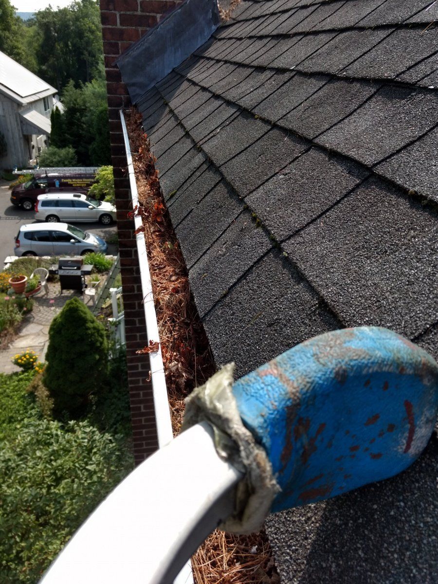 Dirty Gutter — Hadley, MA — Family Window Cleaning & Property Maintenance