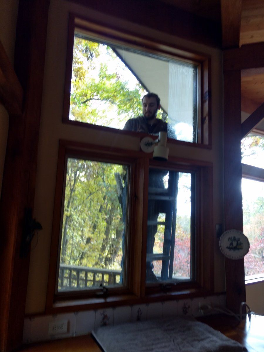Crew Cleaning Windows On Ladder — Hadley, MA — Family Window Cleaning & Property Maintenance