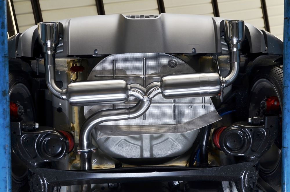 The Exhaust Pipes on the Back of a Car Are Visible — Ace Exhaust Centre in Berserker, QLD