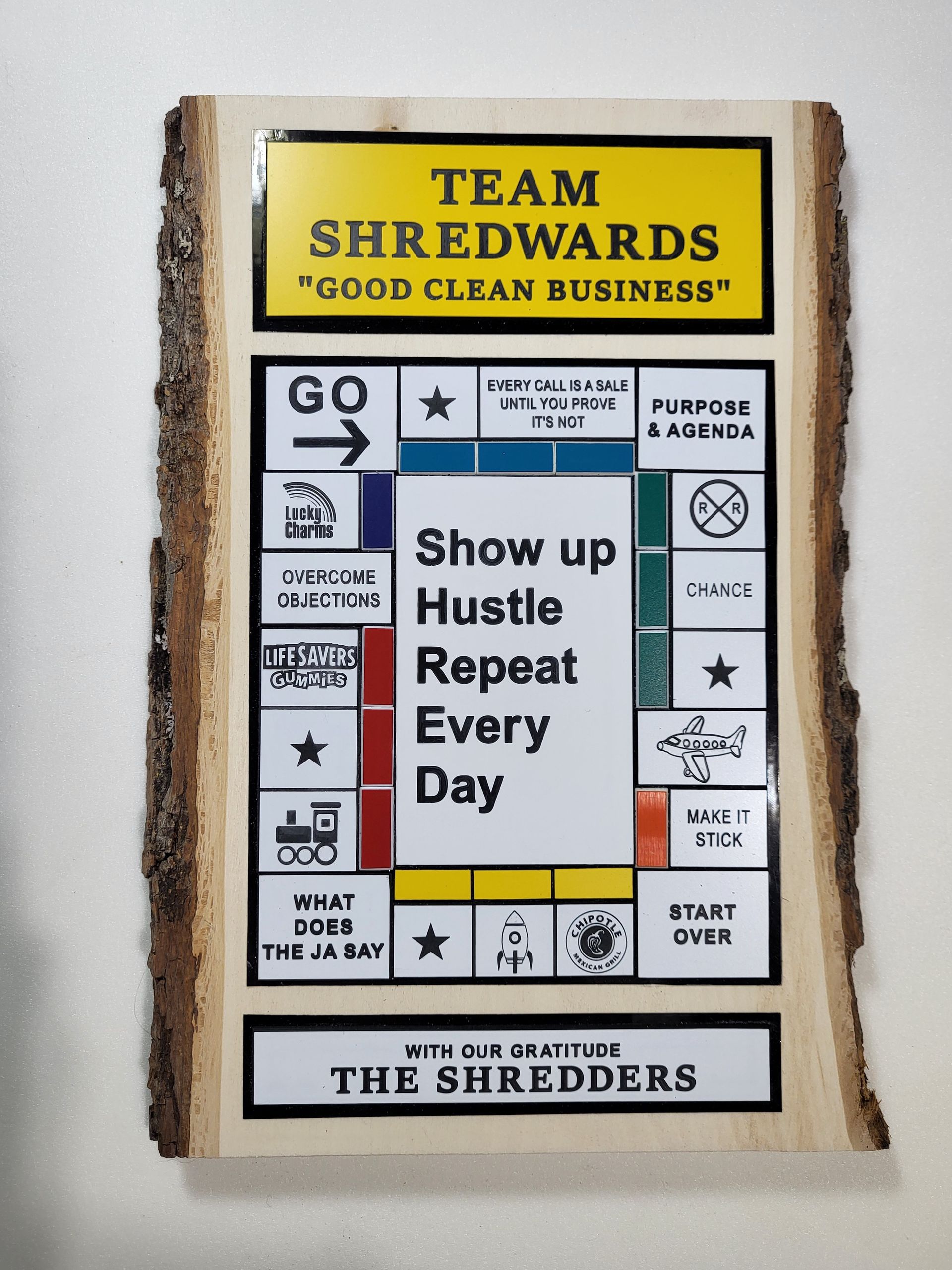 Poster reading “Team Shredwards: Good Clean Business” with “Show up, Hustle, Repeat Every Day” in the center.