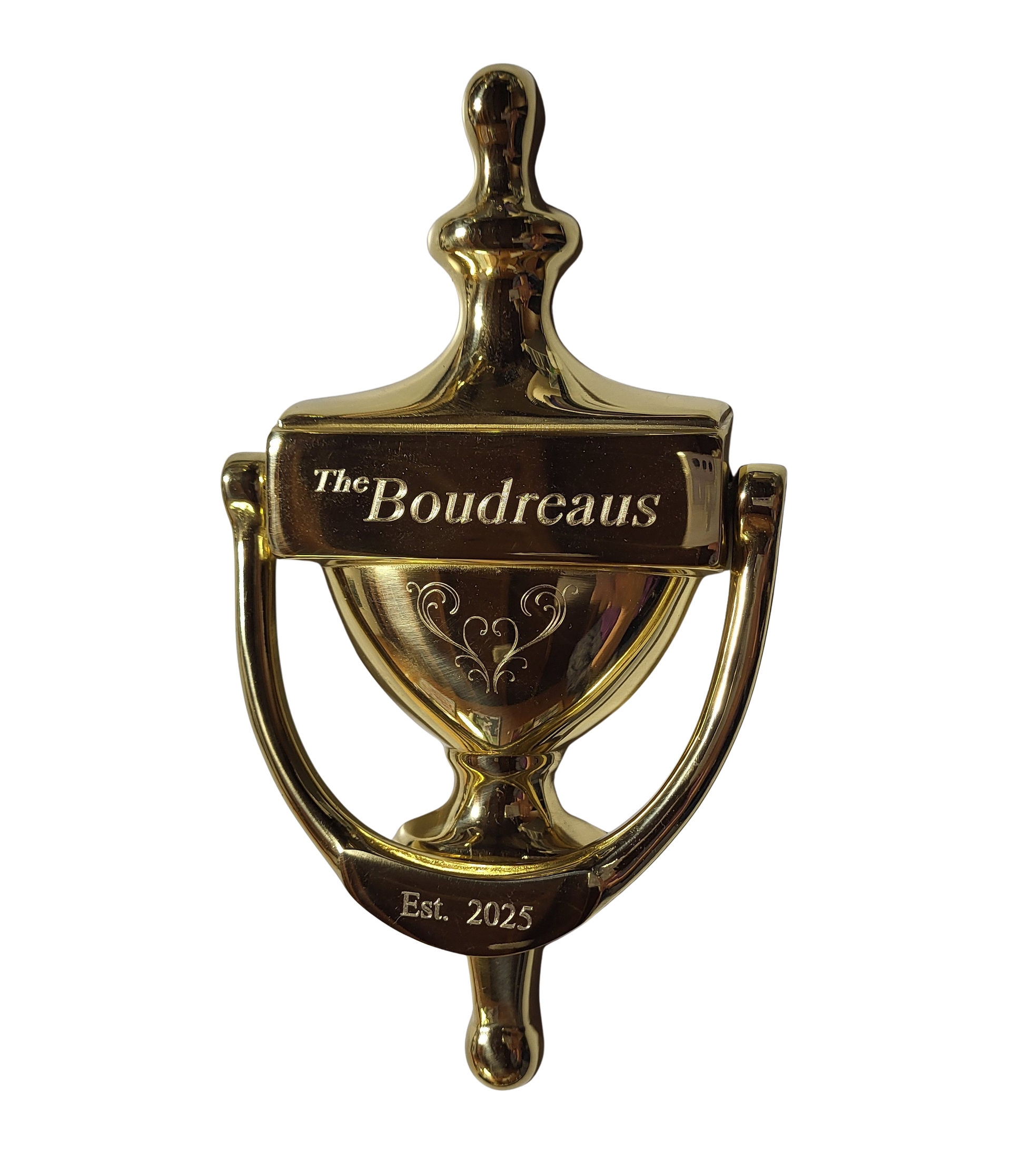 A gold-toned, urn-shaped door knocker engraved with 