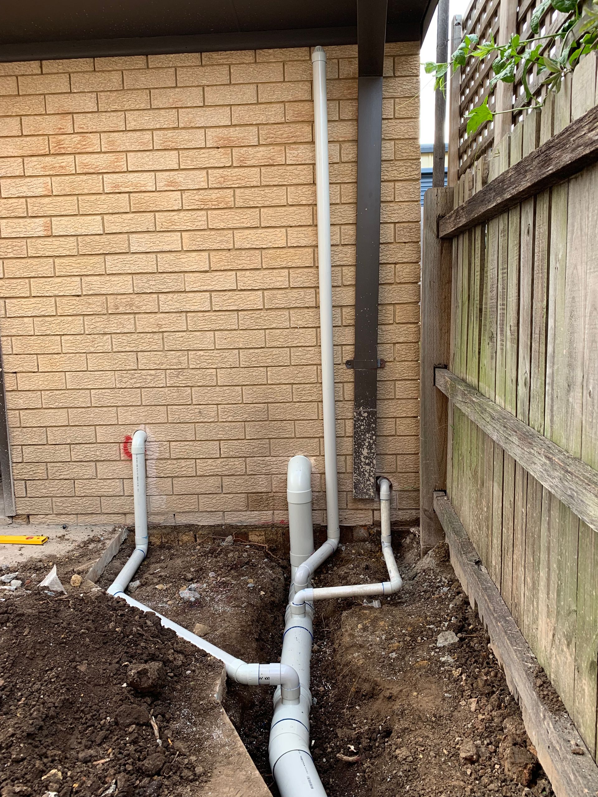 Plumbing Pipes Exposed in a Dirt Trench — Start 2 Finish Plumbing in Cronulla, NSW