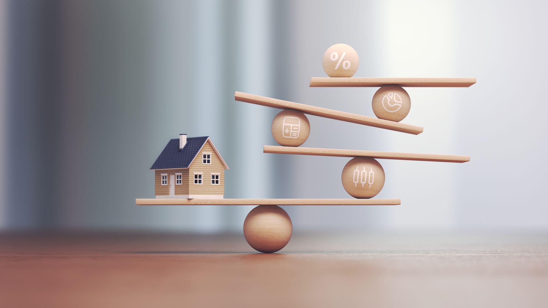 A miniature house balancing on a wooden beam with loan symbols and percentages.