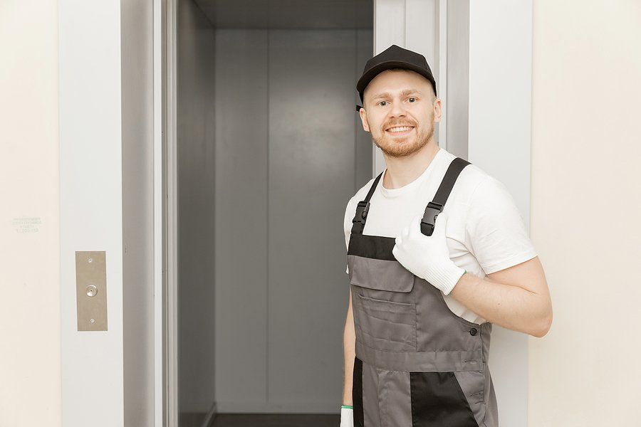 handyman wearing a jumper suit and cap