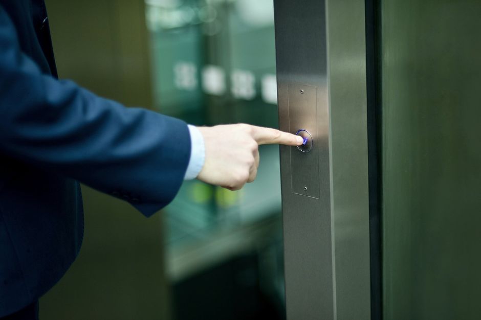 unrecognized person pushing the door bell