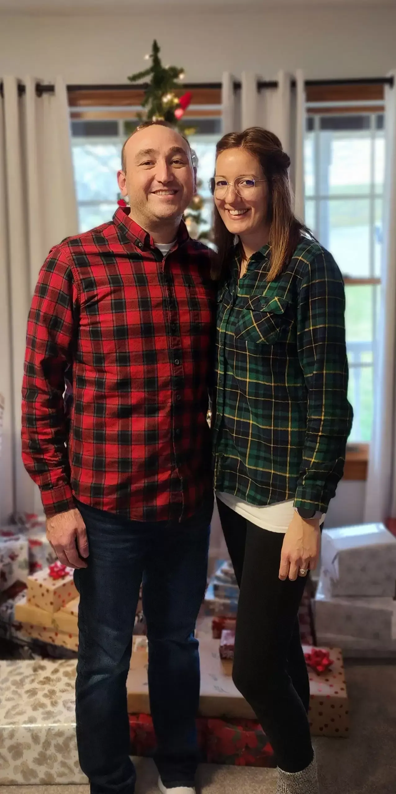 A couple smiles together. 