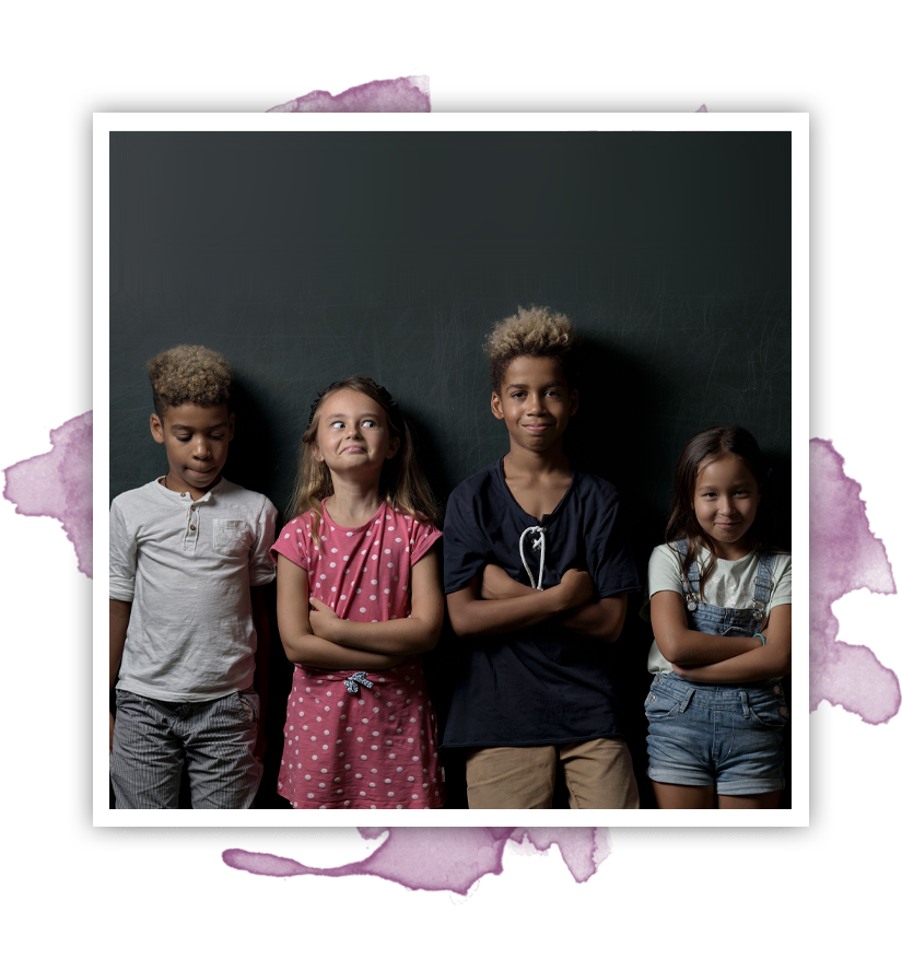 Four diverse children, arms crossed, smile at camera against a dark background.