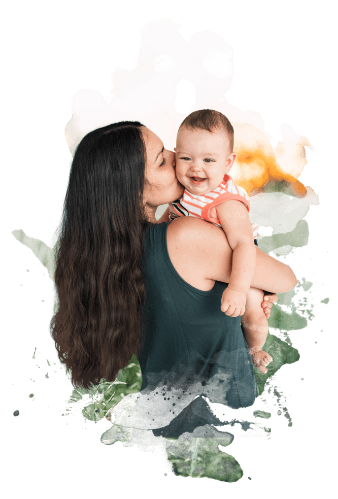Woman kisses a smiling baby; watercolor effect, green and orange hues.