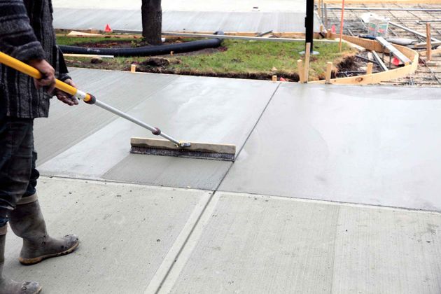 Man working on concrete — Edmond, OK — Crown Rock Concrete