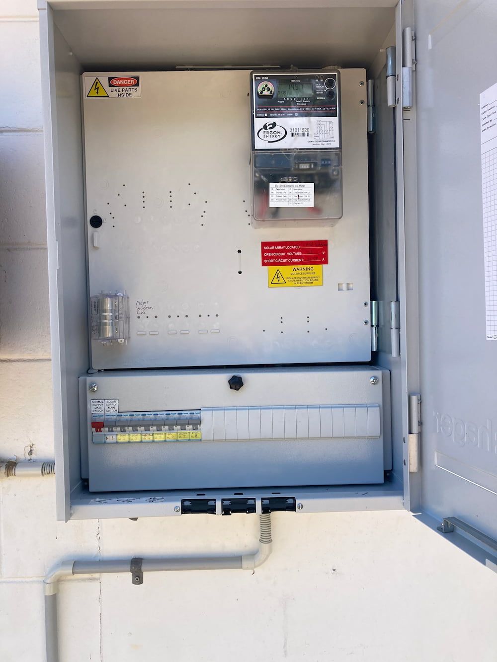 An Electrical Box With A Warning Sign On It — AA Electrical Co in Yeppoon, QLD
