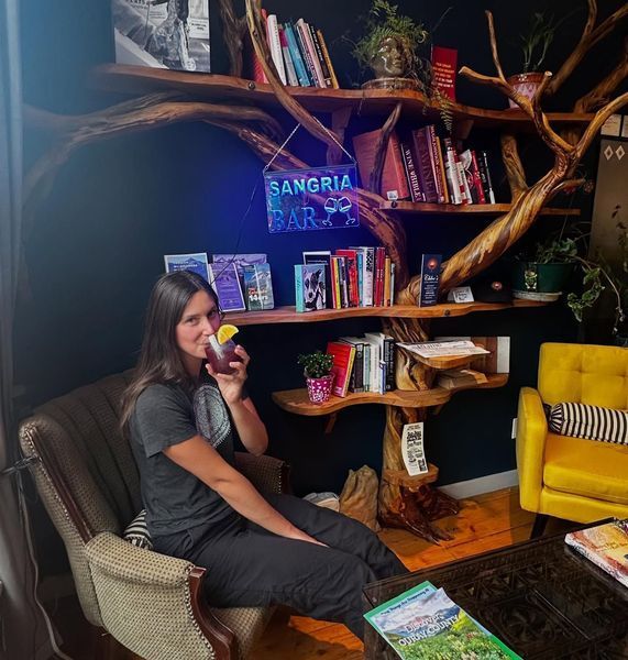 Woman sips a drink