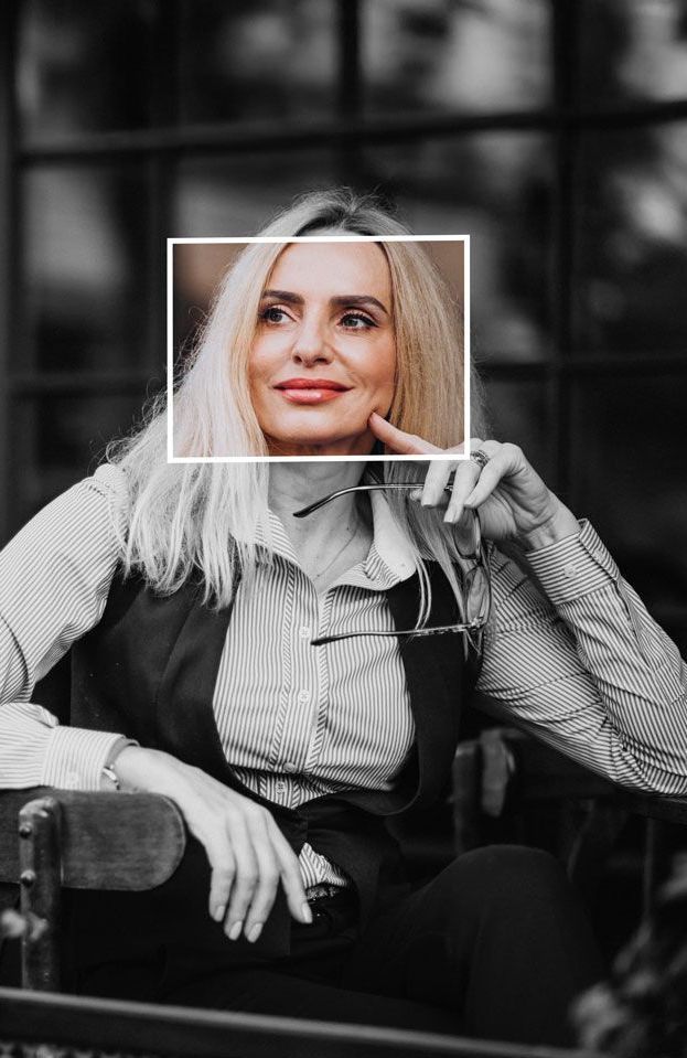 A potential recruiter smiling looing sideways
