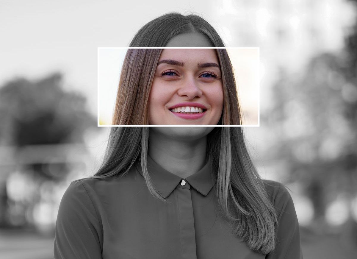 A recruitment specialist is smiling in a black and white photo