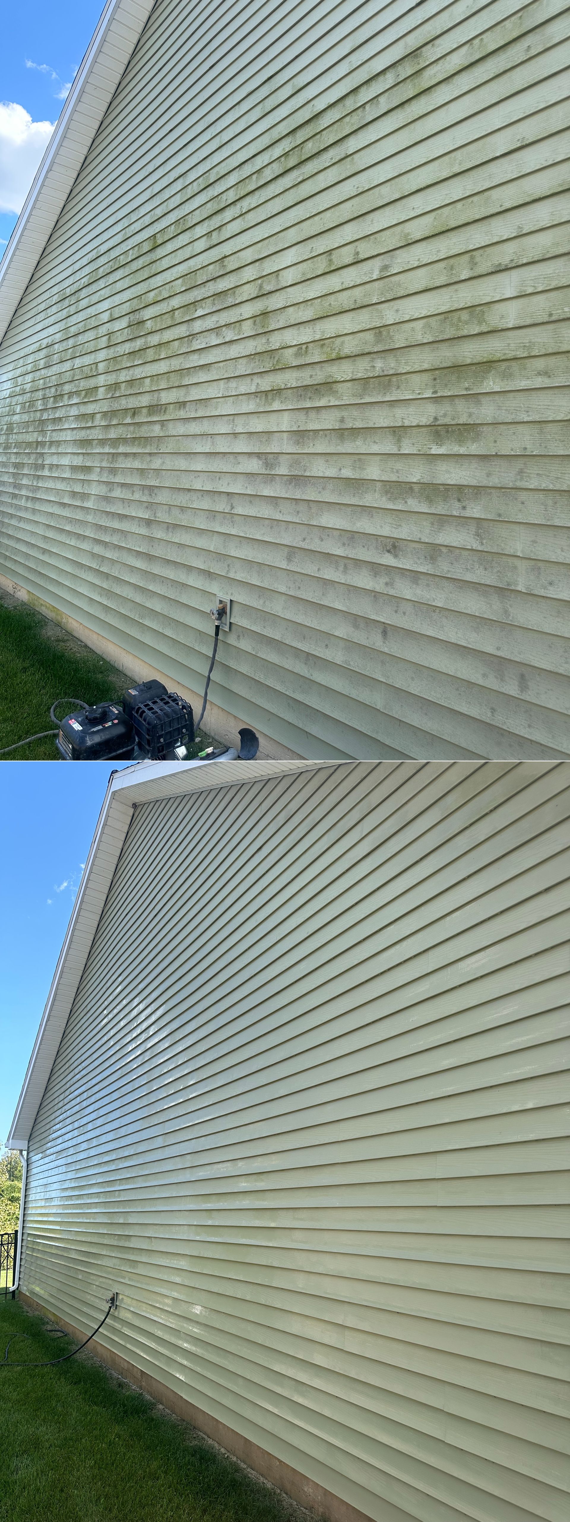 Tall beige wooden fence with green mildew and weather stains, viewed along a narrow side yard.