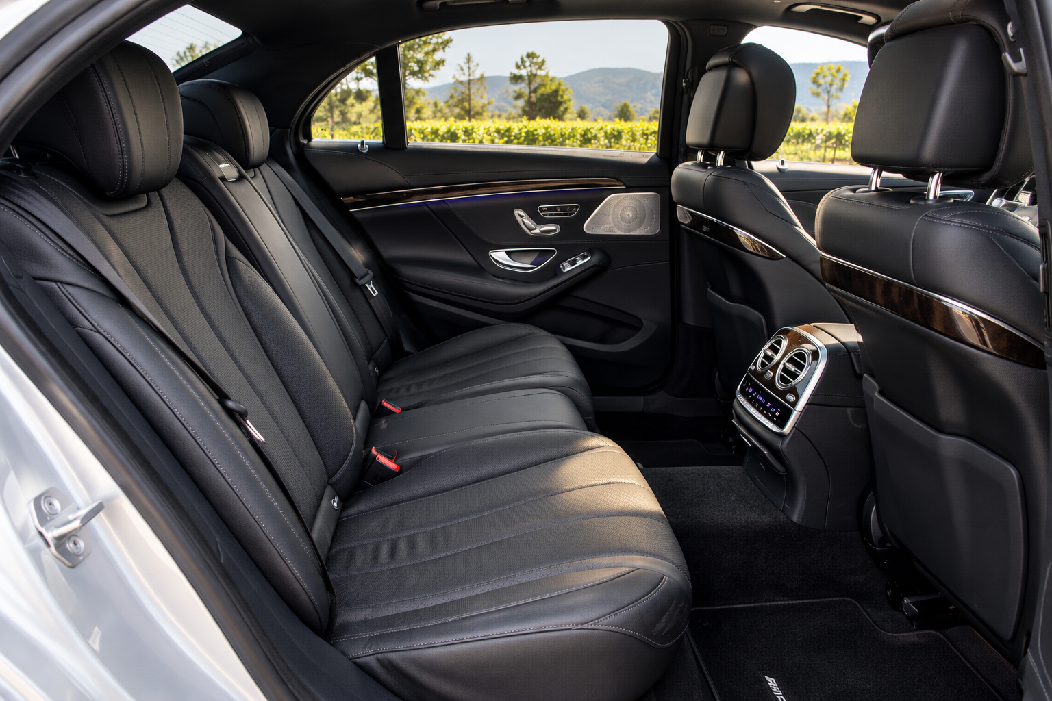 Black leather rear passenger seating in a Mercedes-Benz S560