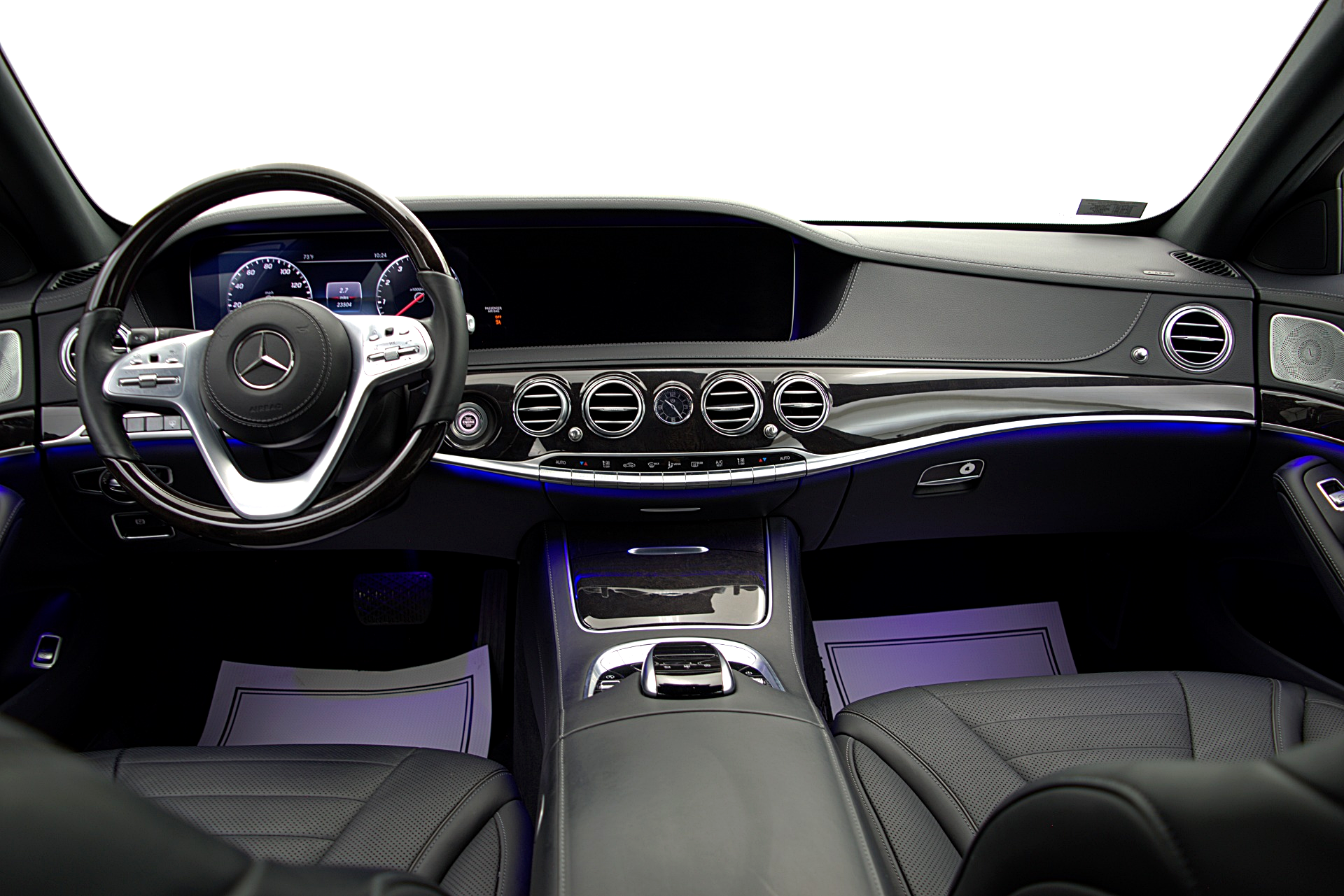 the interior of a mercedes benz s class is shown .