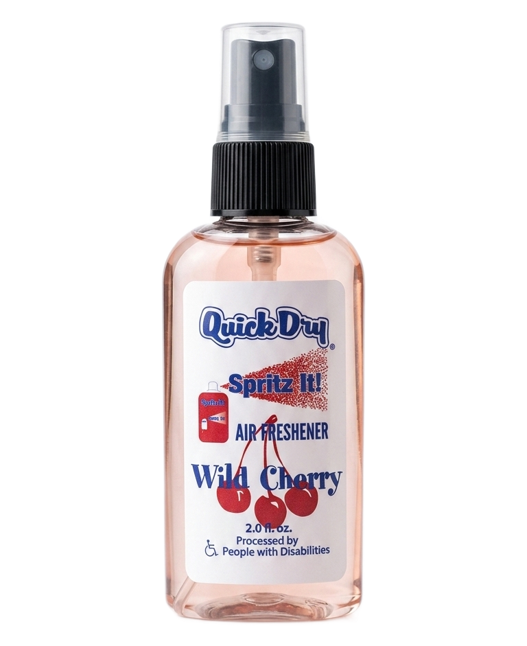 Pink bottle of Quick Dry spray mist air freshener with wild cherry scent label