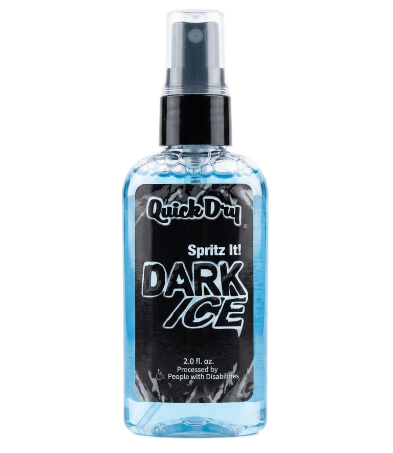 Clear spray bottle labeled “Quick Dry Dark Daze” with blue liquid and black cap