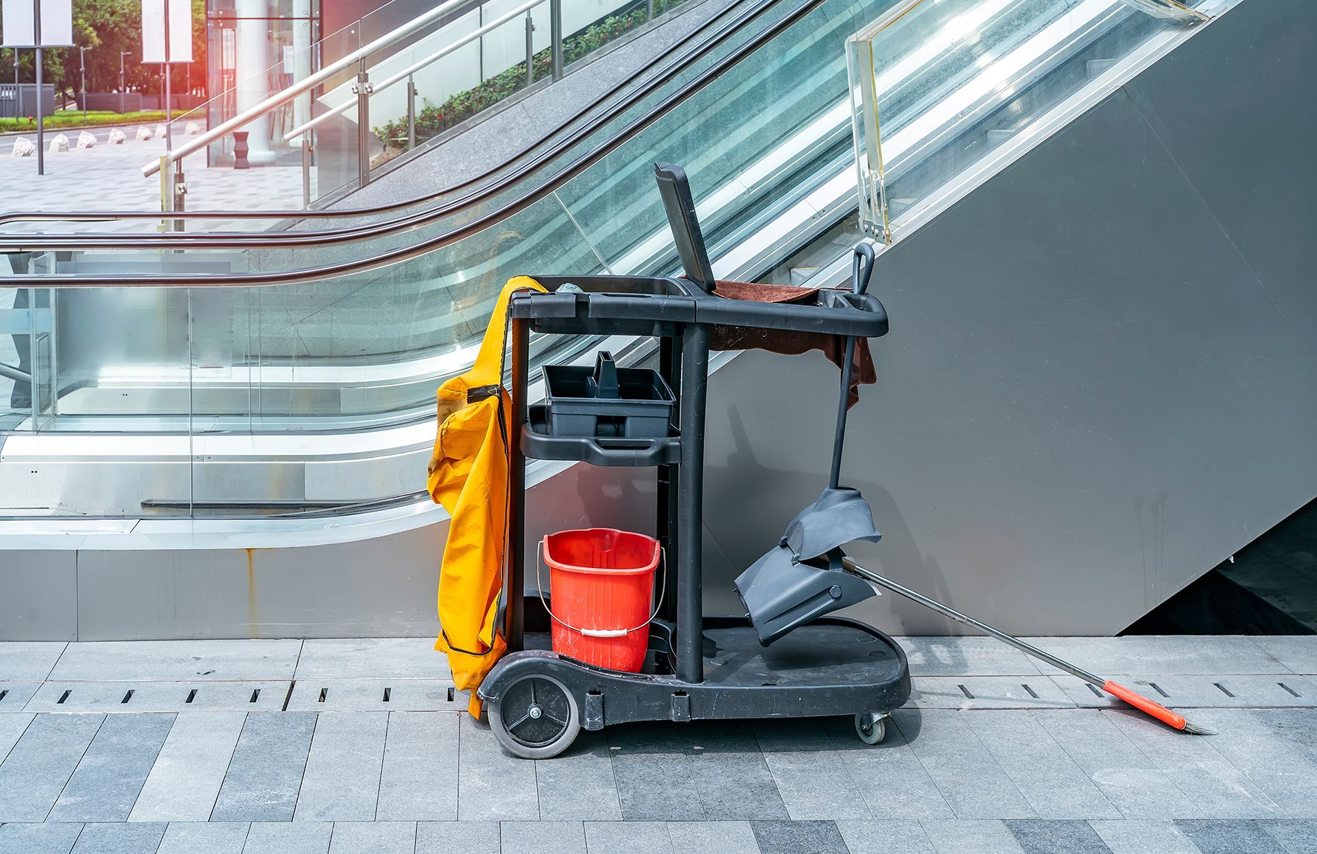Cleaning Cart in Beside the Escalator