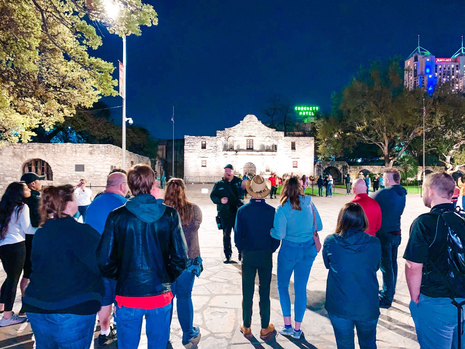 San Antonio Ghost Tour standing in front of the Alamo in San Antonio, Texas.
