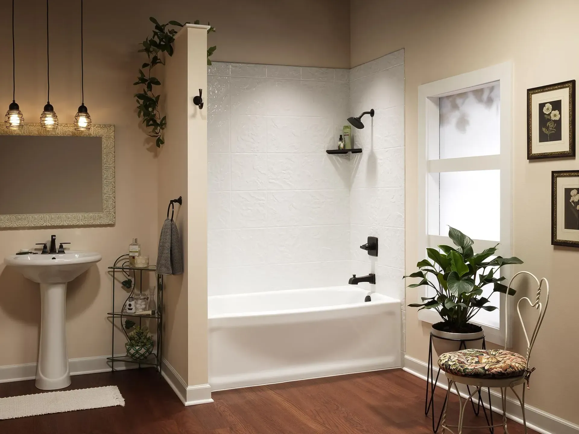 Cozy bathroom with tub, pedestal sink, hanging lights, and potted plant by the window.